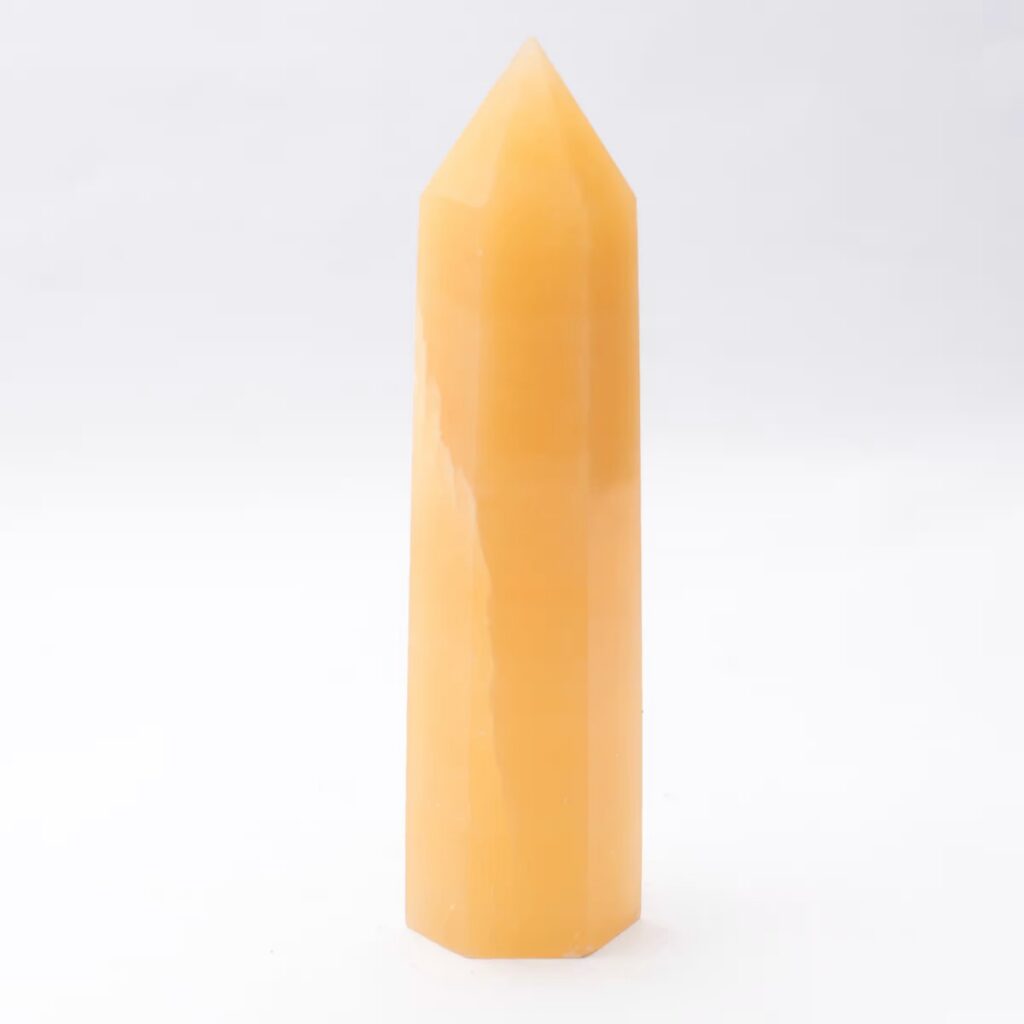 Kalcit žlutý - obelisk - tromlovaný kámen KZO6