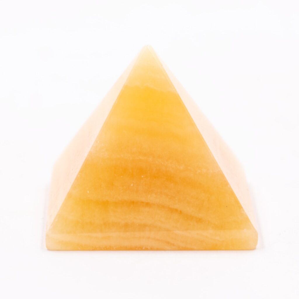 Kalcit oranžový - pyramida - tromlovaný kámen